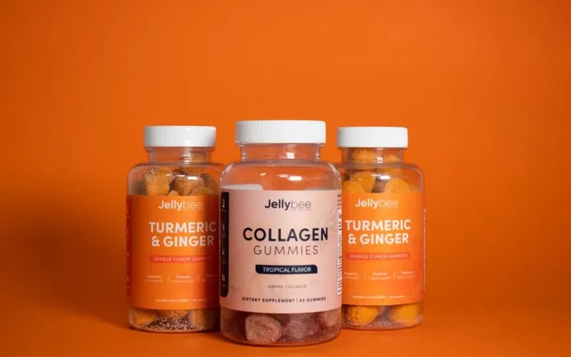 Colorful gummies with turmeric and collagen supplements in product shot.