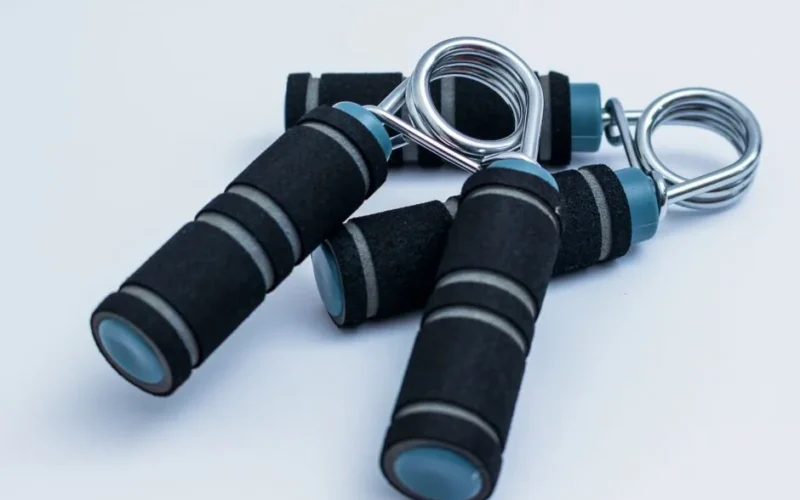 Close-up of foam handle hand grippers for enhancing grip strength during workouts.