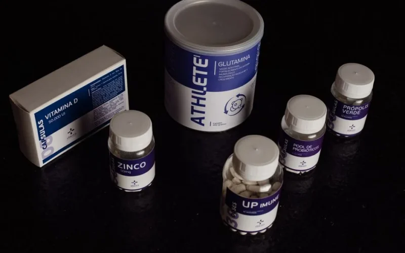 Close-up of a variety of nutritional supplements, vitamins, and probiotics.