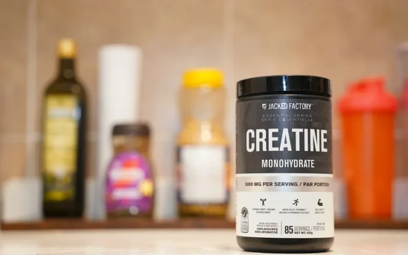 Creatine monohydrate from Jacked Factory displayed on a kitchen counter.